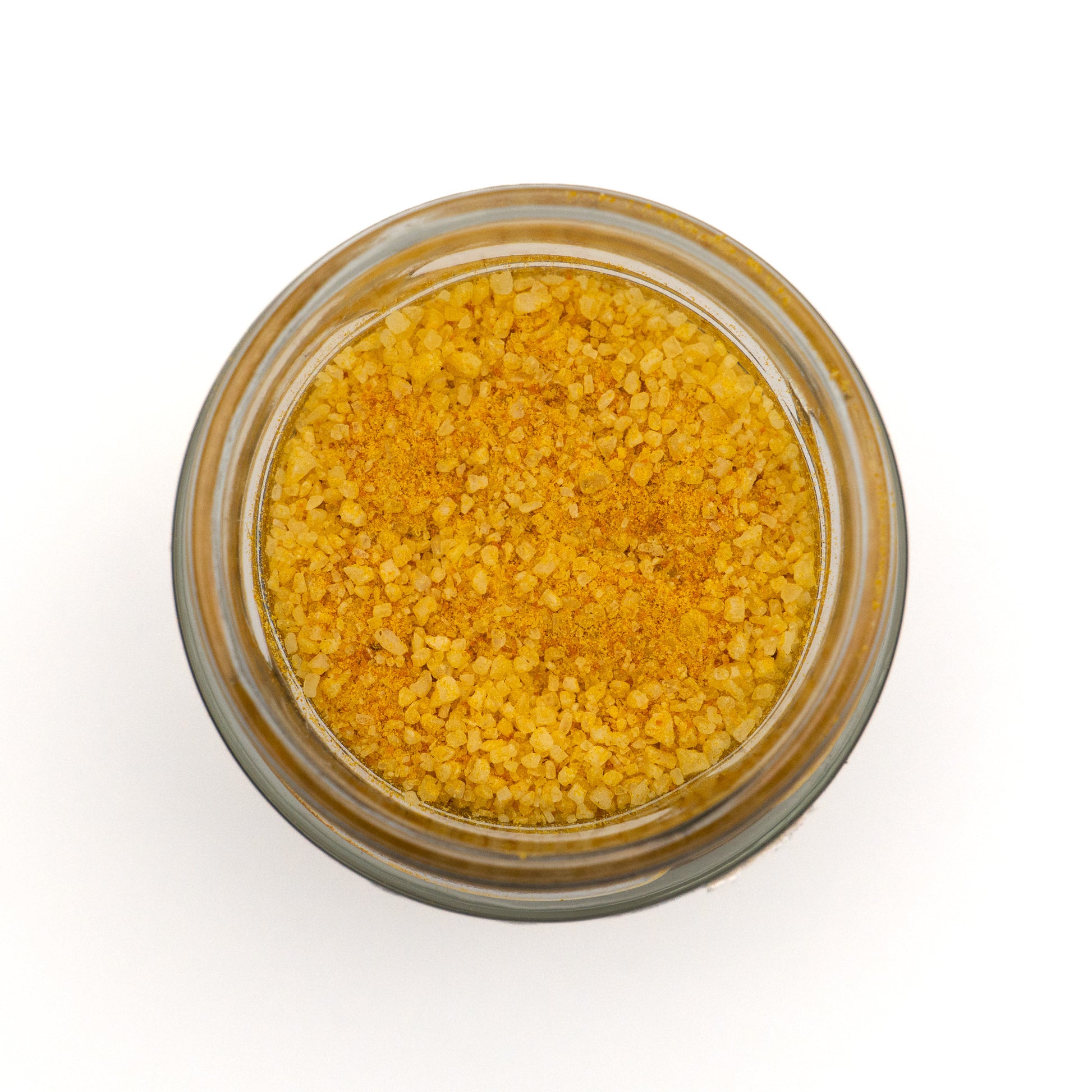 Offenes Glas Kurkumasalz – intensives Gelb durch Kurkuma, feine Körnung