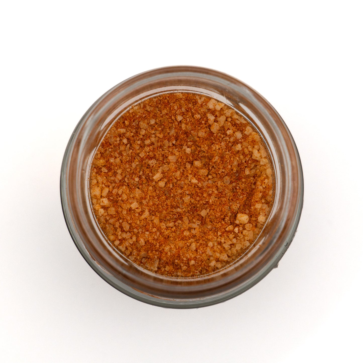 Offenes Glas Paprikasalz – rötliches Meersalz mit Paprikapulver